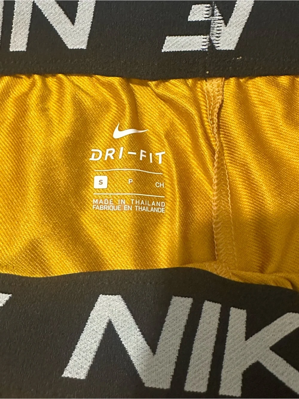 Nike Women's Dri-FIT Gold/Black Athletic Shorts